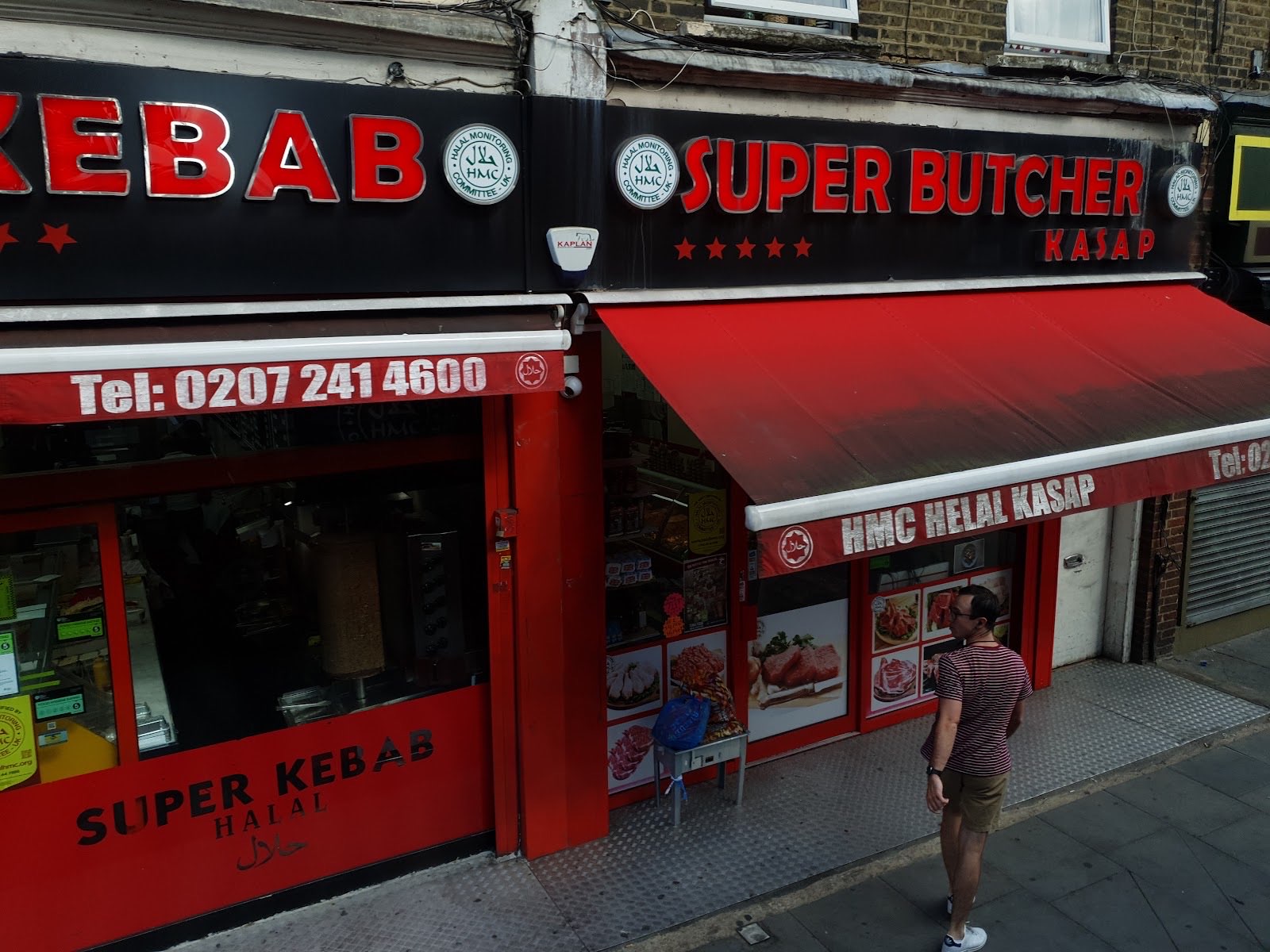 The Super Butcher Kasap shopfront on Stoke Newington Road, with its red awning and HMC Helal Kasap signage.